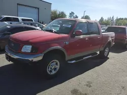 Salvage trucks for sale at Woodburn, OR auction: 2001 Ford F150 Supercrew