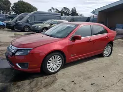 Salvage cars for sale at Hayward, CA auction: 2011 Ford Fusion Hybrid