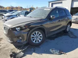 Salvage cars for sale at auction: 2016 Mazda CX-5 Touring