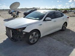 Salvage cars for sale at West Palm Beach, FL auction: 2017 KIA Optima Hybrid