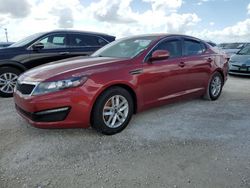 Flood-damaged cars for sale at auction: 2011 KIA Optima LX