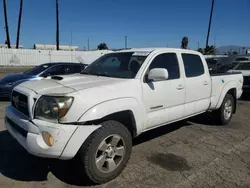 Salvage cars for sale from Copart Van Nuys, CA: 2011 Toyota Tacoma Double Cab Long BED