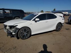 Salvage vehicles for parts for sale at auction: 2019 Toyota Camry Hybrid