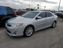 2014 Toyota Camry Hybrid en venta en Riverview, FL