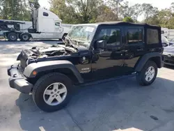 Salvage SUVs for sale at auction: 2017 Jeep Wrangler Unlimited Sport