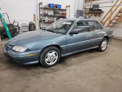 Salvage cars for sale at auction: 1997 Pontiac Grand AM SE