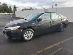 Salvage cars for sale from Copart Portland, OR: 2016 Toyota Camry Hybrid