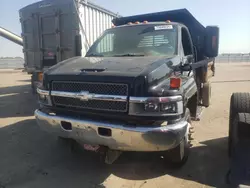 Salvage trucks for sale at Eldridge, IA auction: 2003 Chevrolet C4500 C4C042