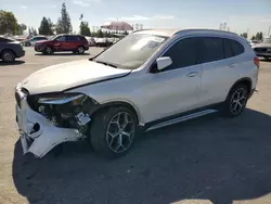 Salvage cars for sale from Copart Rancho Cucamonga, CA: 2019 BMW X1 XDRIVE28I