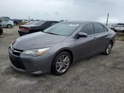 Flood-damaged cars for sale at auction: 2015 Toyota Camry LE