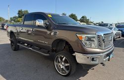 Salvage trucks for sale at Oklahoma City, OK auction: 2016 Nissan Titan XD SL