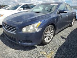 Carros dañados por inundaciones a la venta en subasta: 2011 Nissan Maxima S