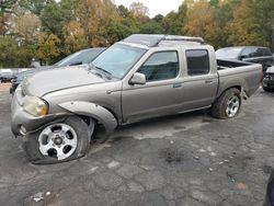 Salvage cars for sale at Austell, GA auction: 2004 Nissan Frontier Crew Cab XE V6