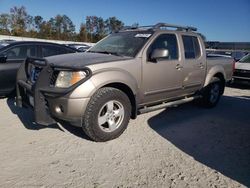 Flood-damaged cars for sale at auction: 2008 Nissan Frontier Crew Cab LE