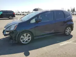 Honda salvage cars for sale: 2009 Honda FIT Sport