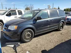 2013 Dodge Grand Caravan SE en venta en Lansing, MI