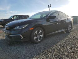 Flood-damaged cars for sale at auction: 2019 Honda Civic LX