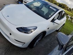 Flood-damaged cars for sale at auction: 2024 Tesla Model Y