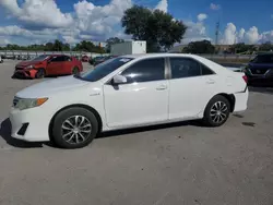 Salvage cars for sale at Orlando, FL auction: 2012 Toyota Camry Hybrid