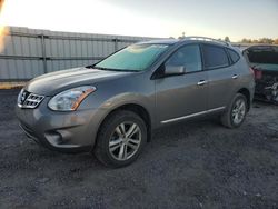 Carros salvage sin ofertas aún a la venta en subasta: 2013 Nissan Rogue S