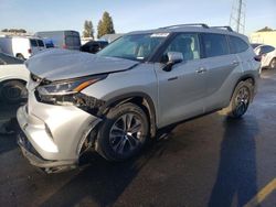 Salvage cars for sale at Hayward, CA auction: 2021 Toyota Highlander Hybrid XLE