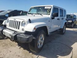 Jeep Wrangler salvage cars for sale: 2014 Jeep Wrangler Unlimited Sahara