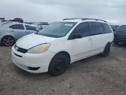 Salvage cars for sale at Arcadia, FL auction: 2005 Toyota Sienna CE