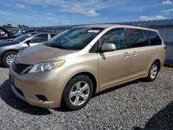 Flood-damaged cars for sale at auction: 2012 Toyota Sienna LE