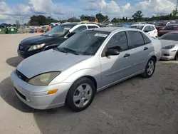 Flood-damaged cars for sale at auction: 2004 Ford Focus ZTS