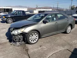 Salvage cars for sale at Sun Valley, CA auction: 2013 Toyota Camry Hybrid