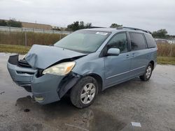 Salvage vehicles for parts for sale at auction: 2004 Toyota Sienna XLE