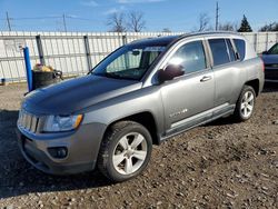 Salvage cars for sale from Copart Lansing, MI: 2011 Jeep Compass Sport