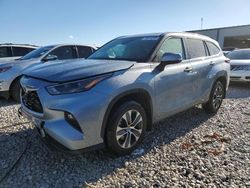 Salvage cars for sale at Wayland, MI auction: 2022 Toyota Highlander Hybrid XLE