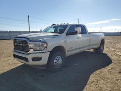 Salvage trucks for sale at Brighton, CO auction: 2022 Dodge 3500 Laramie