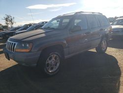 Salvage cars for sale from Copart San Martin, CA: 2000 Jeep Grand Cherokee Laredo