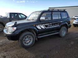 Salvage cars for sale from Copart Rocky View County, AB: 1998 Toyota Land Cruiser