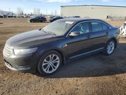 Salvage cars for sale at Rocky View County, AB auction: 2013 Ford Taurus SEL