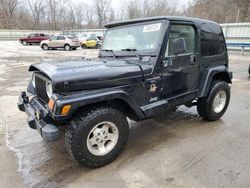Salvage cars for sale from Copart Ellwood City, PA: 2001 Jeep Wrangler / TJ Sahara