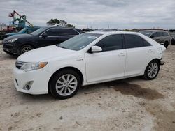 Salvage cars for sale from Copart Haslet, TX: 2014 Toyota Camry Hybrid