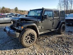 Salvage SUVs for sale at auction: 2013 Jeep Wrangler Unlimited Sahara