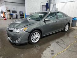 Salvage cars for sale from Copart Ham Lake, MN: 2012 Toyota Camry Hybrid