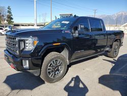 Salvage cars for sale from Copart Rancho Cucamonga, CA: 2022 GMC Sierra K2500 AT4