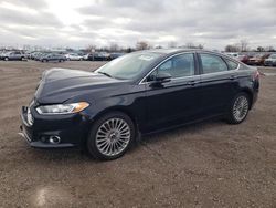 Salvage cars for sale from Copart London, ON: 2013 Ford Fusion Titanium