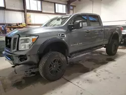 Salvage cars for sale from Copart Nisku, AB: 2016 Nissan Titan XD SL