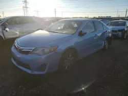 Carros salvage sin ofertas aún a la venta en subasta: 2013 Toyota Camry Hybrid