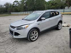 Salvage cars for sale at Fort Pierce, FL auction: 2016 Ford Escape Titanium