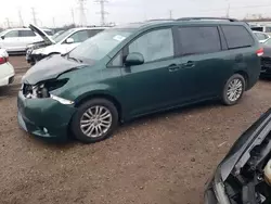 Salvage cars for sale at auction: 2011 Toyota Sienna XLE