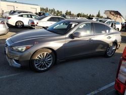 Salvage cars for sale from Copart Rancho Cucamonga, CA: 2021 Infiniti Q50 Luxe