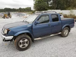 Salvage cars for sale at Fairburn, GA auction: 2000 Nissan Frontier Crew Cab XE