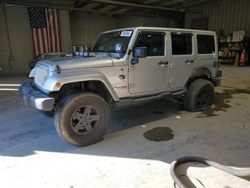 Salvage cars for sale at West Mifflin, PA auction: 2012 Jeep Wrangler Unlimited Sahara